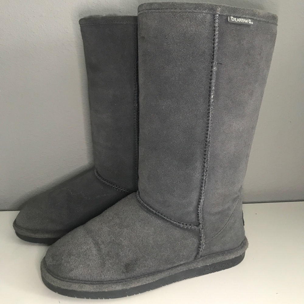 A tall grey size 8 pair of bear paws